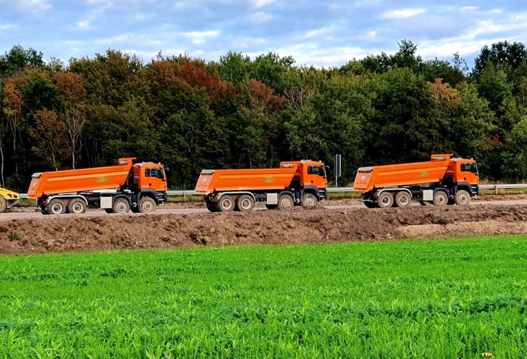 dump-trucks-parked-on-the-road